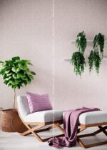 Silk Plaster Relief 331 in pale pink on a living room wall with a chaise longue and plants