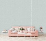Silk Plaster Prestige 403 in pale mint above a pink sofa on a herringbone wood floor