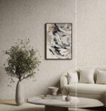 Silk Plaster Prestige 401 in cream behind a boucle sofa, olive tree and framed abstract art