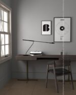 PrimeColor 5 tinted B11 pale grey home office wall with framed typography prints above a desk
