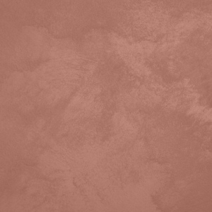Close-up of Sabbia sand-effect paint texture in shade SA35, warm terracotta pink