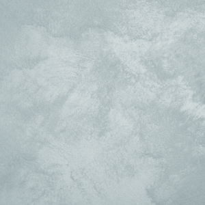 Close-up of Sabbia sand-effect paint texture in shade SA12, pale sea-foam grey-blue