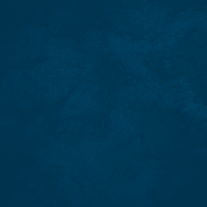 Close-up of Sabbia sand-effect paint texture in shade SA43, deep navy blue