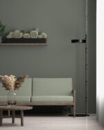 PrimeColor 5 tinted B17 olive green living room wall with a cactus display shelf and a sage sofa