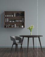 PrimeColor 5 tinted B10 blue-grey dining nook wall with a dark wood shelving unit and a round table