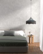 Grey Marmorino Carrara plaster wall in a modern bedroom interior