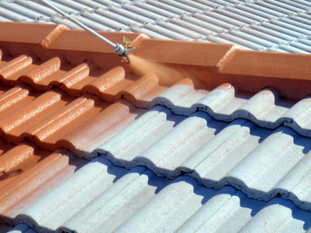 Rubber paint applied on slate and ceramic roof tiles coated with rubber paint