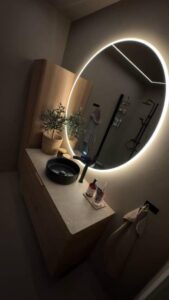 Finished microcement shower with black fixtures - Norway bathroom project