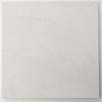 Marmorino Carrara sample tile in white with layered travertine-style relief and veining