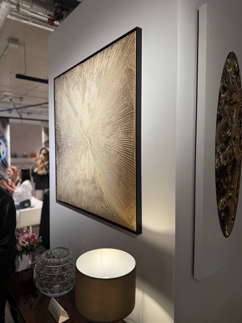 Travertino Naturale decorative plaster wall panel by Sandra at Archideco Riga — framed gold-toned Silk Plaster lime plaster with radial troweling