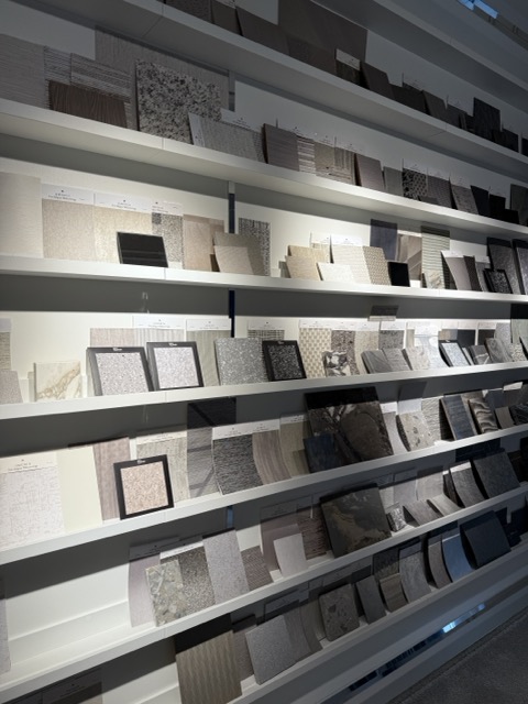 Rows of Silk Plaster liquid wallpaper sample boards in the Archideco Designer’s Library, Riga